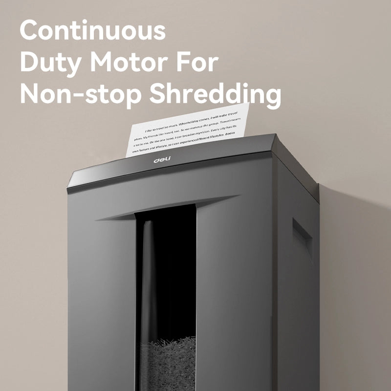 Shredder with continuous duty motor for non-stop shredding on a beige background Deli ET095 Paper Shredder